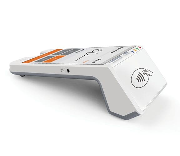 A white device with an orange and black design.